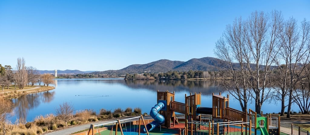 Modern lakeside all-abilities playground in Canberra on a sunny winter morning